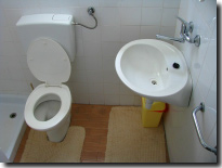 Sink and toilet in the first bathroom